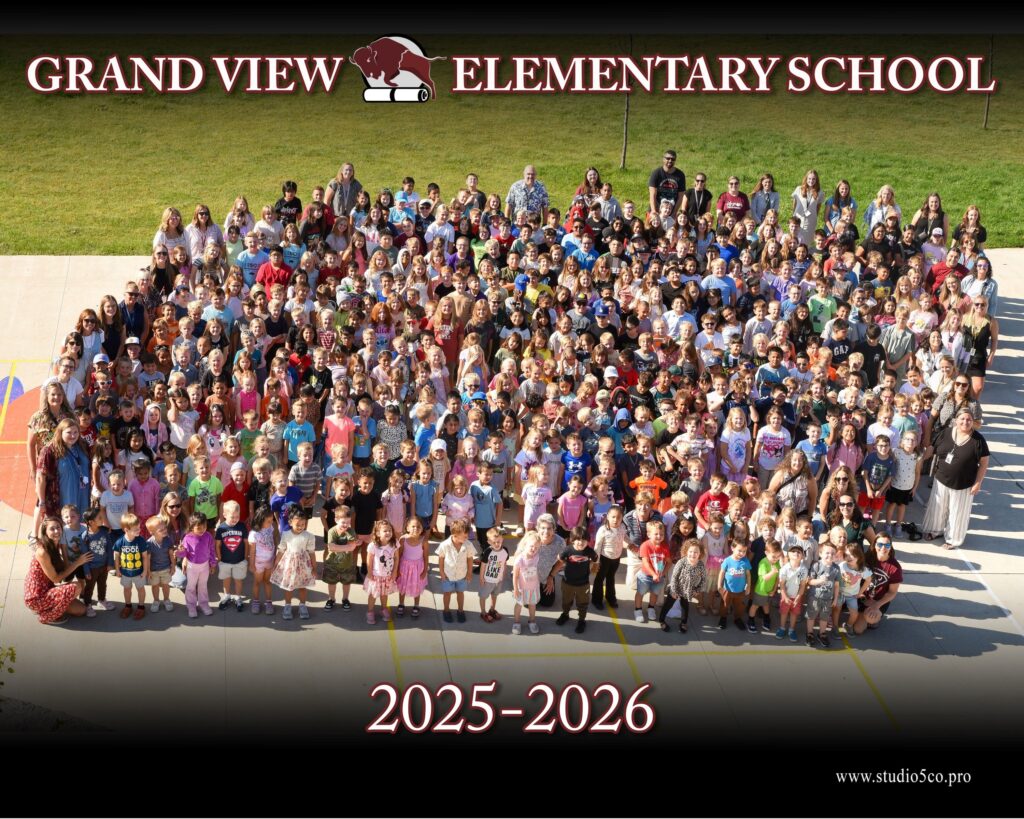 A large group of students and teachers pose for a photo outside Grand View Elementary School, 2025-2026.